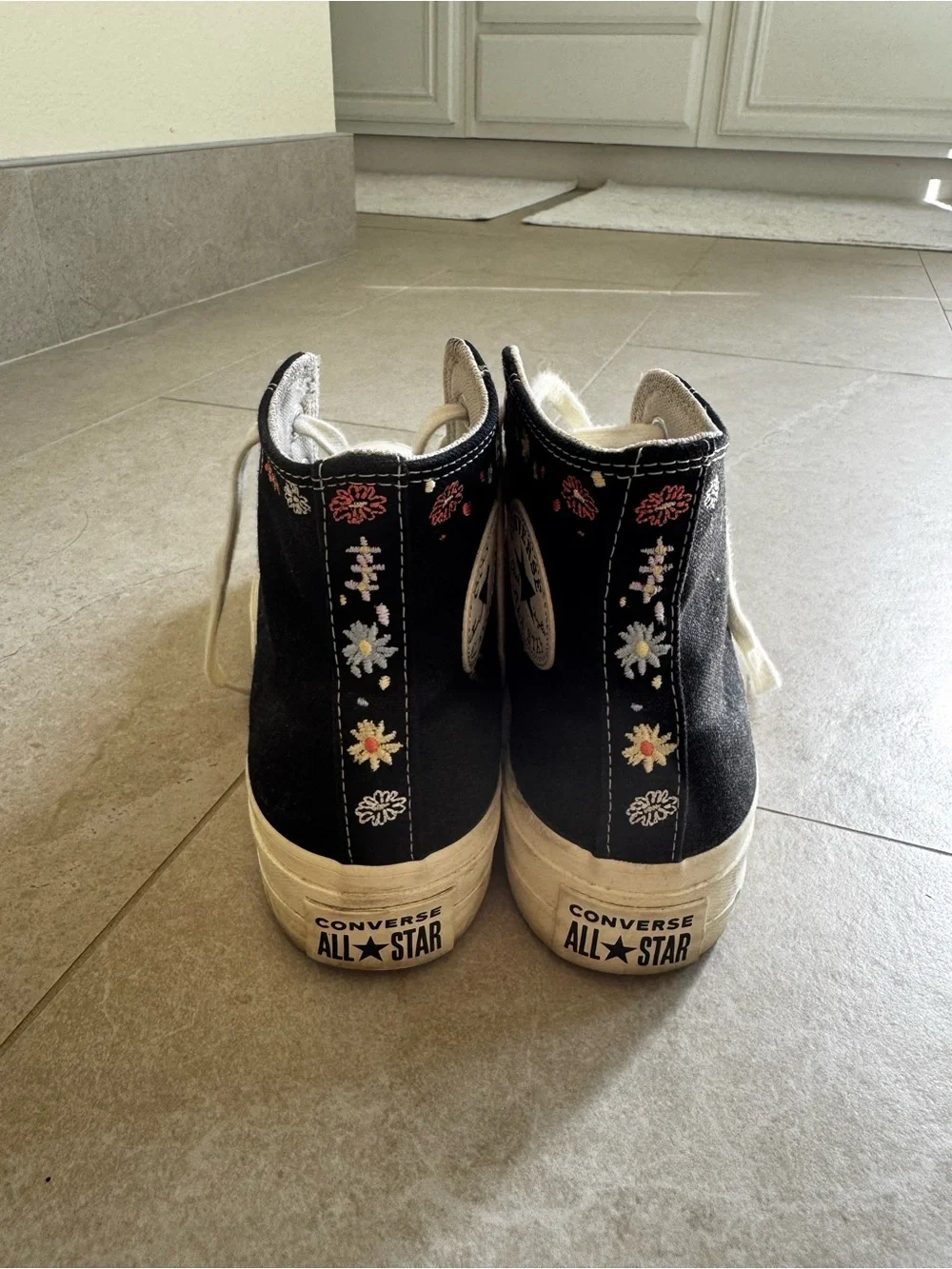 Black High-Top Canvas Sneakers with White Laces and Subtle Floral Embroidery